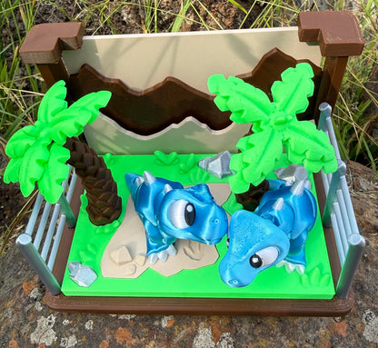 3d printed diorama with two blue trex 